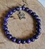 charoïet armband met vlinder_