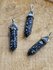 Sneeuwvlok Obsidiaan Healing Point – kracht, bescherming & doorzetten_
